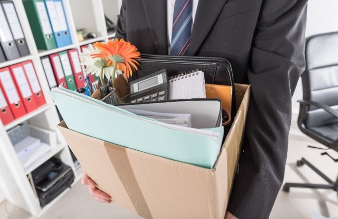 businessman-leaving-with-box